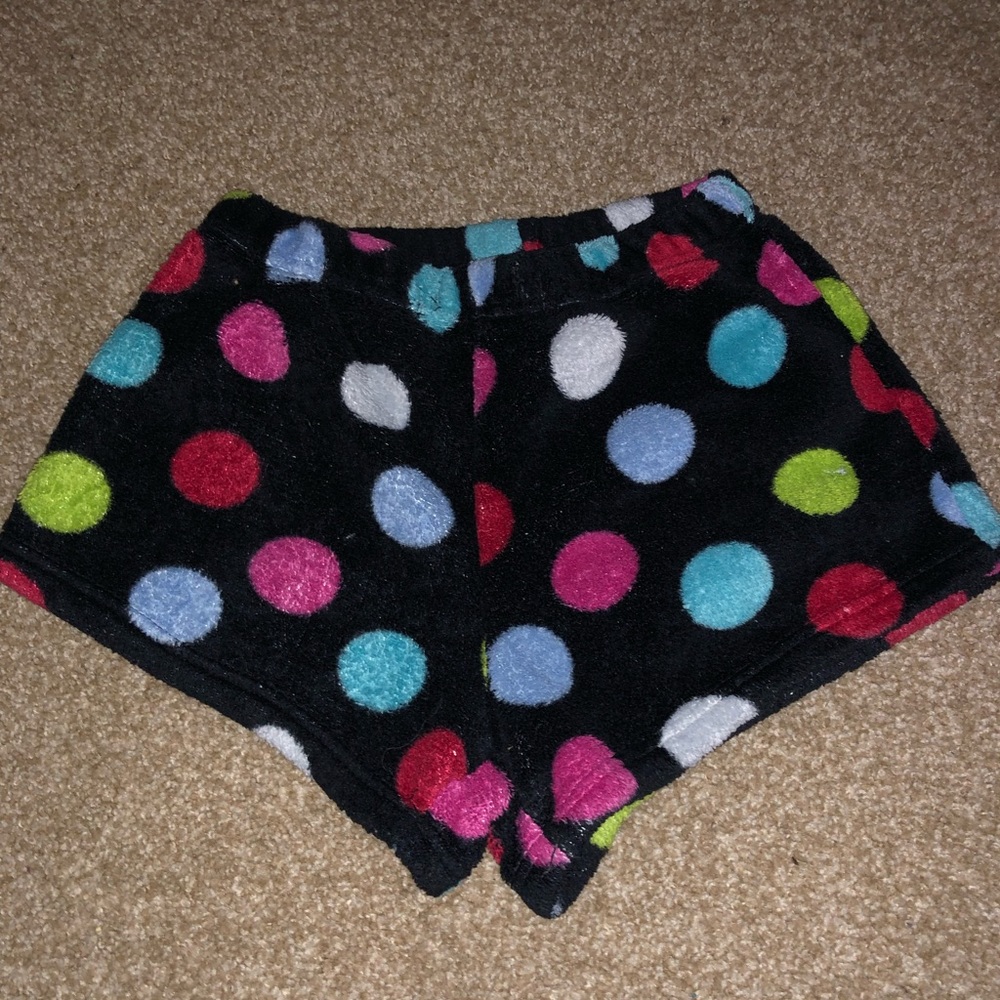 pock-a dot black based flees pajama shorts.
